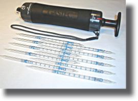 Colorimetric indicator system for low-cost measuring of perc / perchloroethylene / tetrachloroethylene gas in dry cleaning establishments.